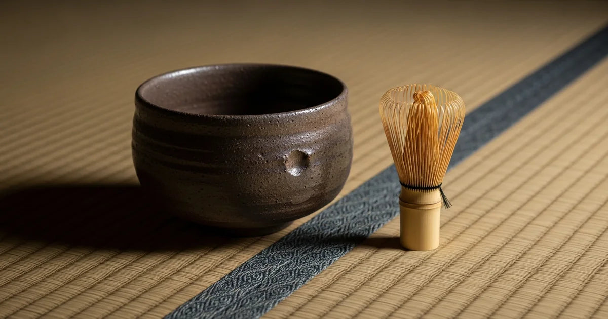 Rustic Japanese tea ceremony with simple chawan showing wabi-cha influence